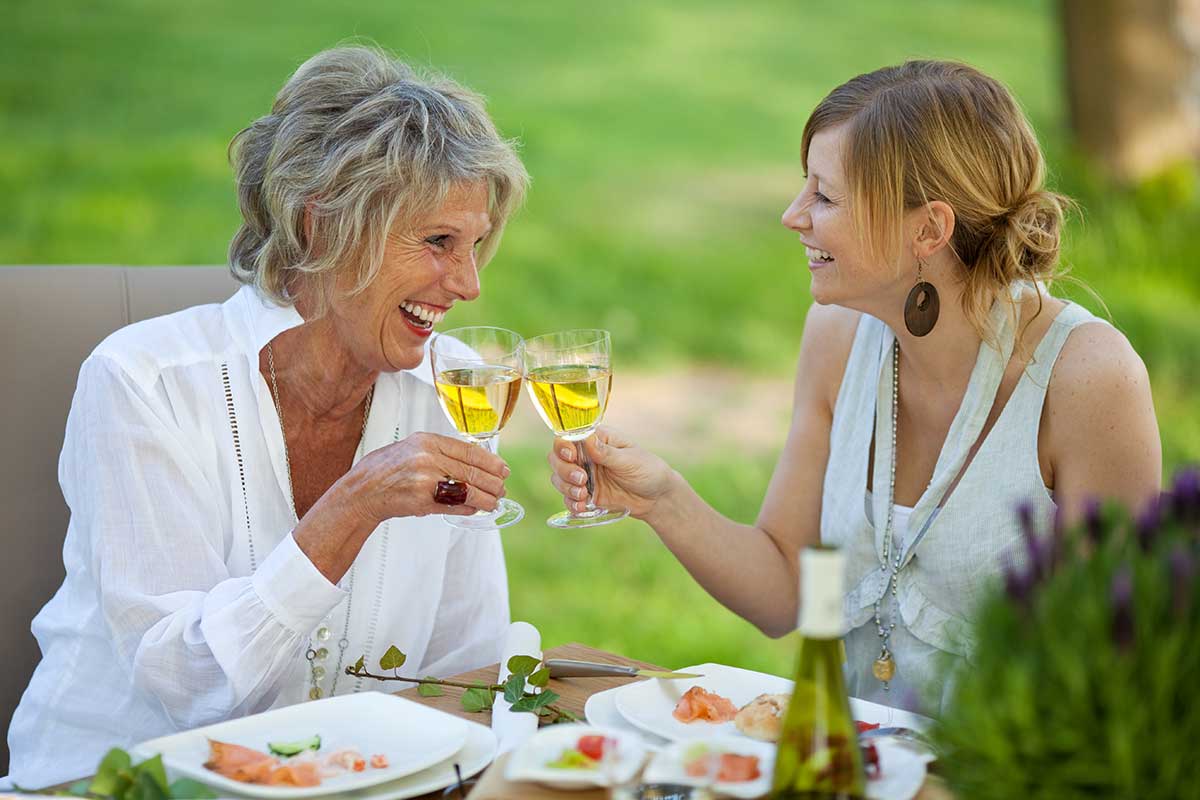 dental implant patients enjoying wine in new hyde park